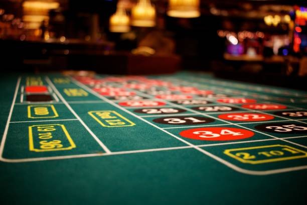 Live casino studio interface showing dealer table and table information