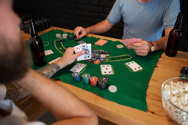 Live dealer studio with cards, table camera, and mobile payment context